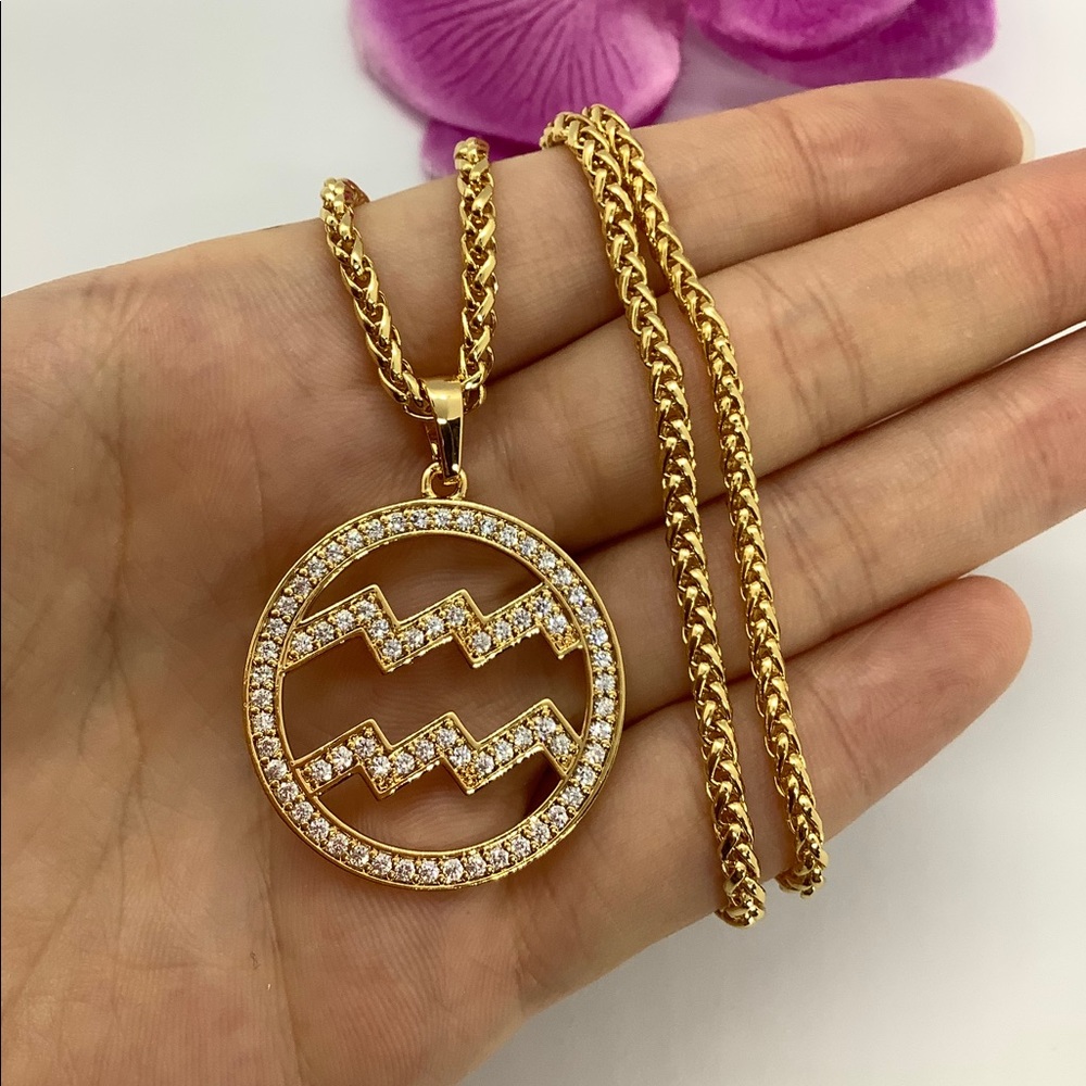 New 18k gold Aquarius necklaces